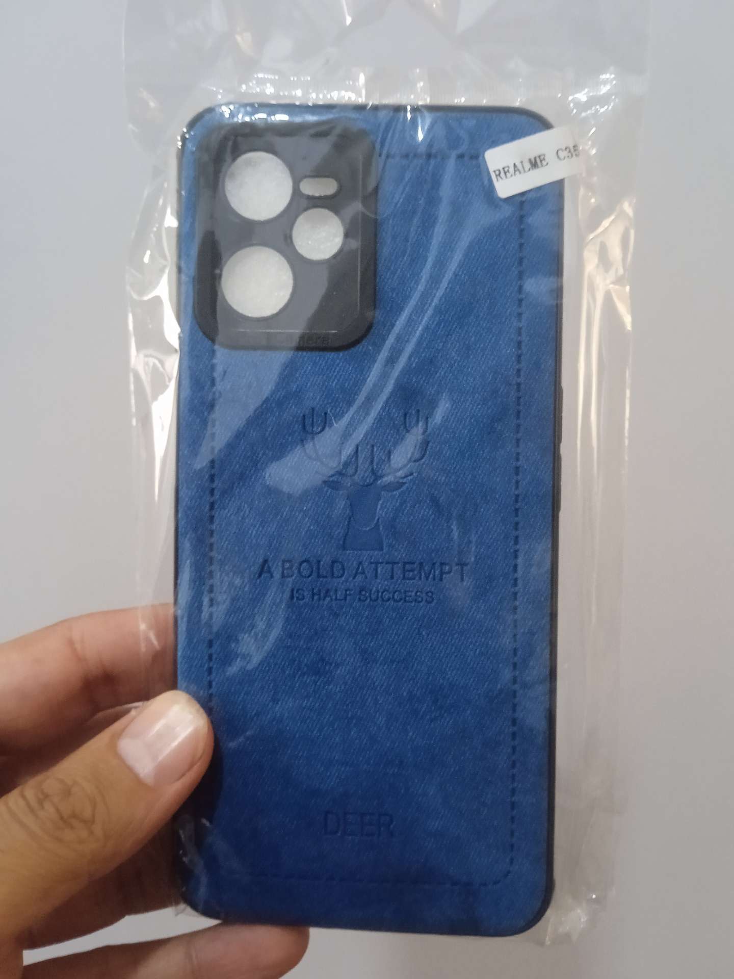 کاور چرمی پارچه ای طرح گوزن گوشی موبایل ریلمی Realme C35